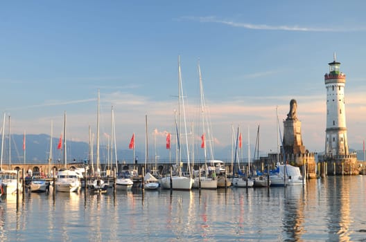 Picturesque view on the entrance of the harbor in Lindau island on Lake Bodensee, Germany