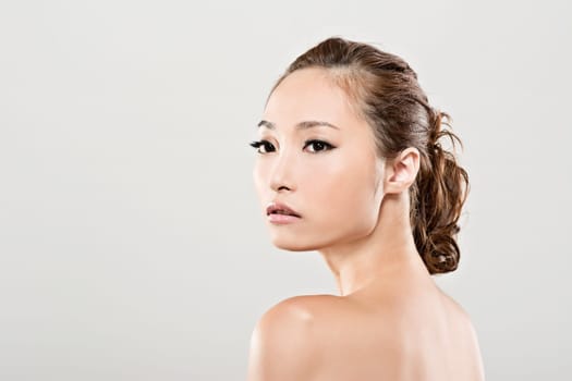 Asian beauty face closeup portrait with clean and fresh elegant lady. Studio shot.