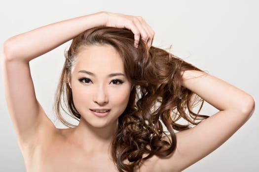 Asian beauty face closeup portrait with clean and fresh elegant lady. Studio shot.