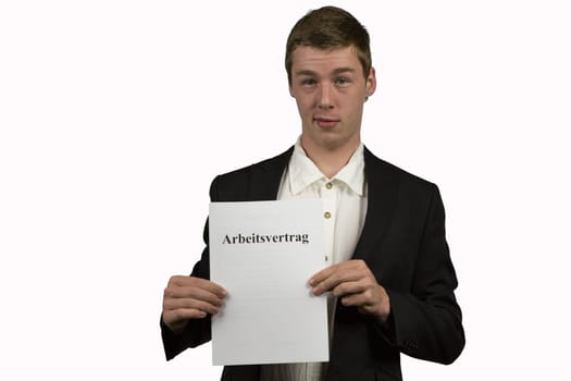 Young man holds an employment contract in his hands and is happy