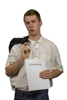 Young man holds the dismissal in his hands and is frustrated