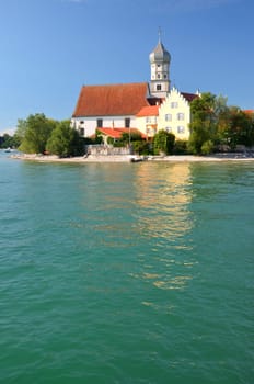 Picturesque view on church in Wasserburg on Lake Bodensee, Germany