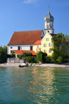 Picturesque view on church in Wasserburg on Lake Bodensee, Germany