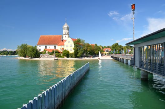 Picturesque view on church in Wasserburg on Lake Bodensee, Germany