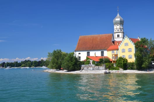 Picturesque view on church in Wasserburg on Lake Bodensee, Germany