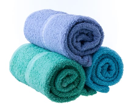 Colorful towels isolated on white background