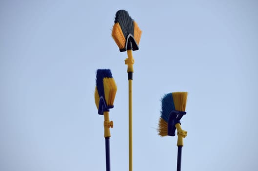 Broom trio