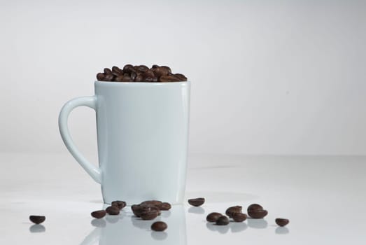 Cup with coffee beans