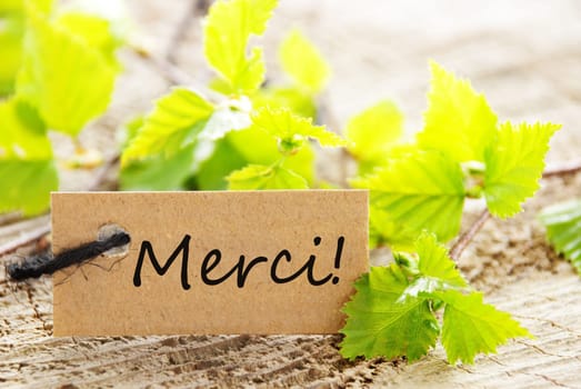 a natural looking label with merci