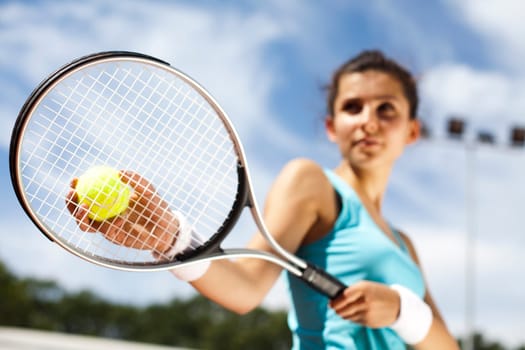 Woman playing tennis