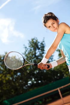 Girl playing tennis