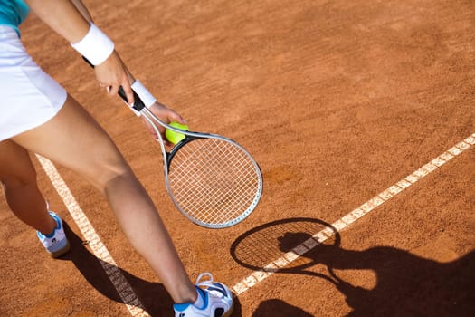 Young woman playing tennis