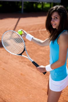 Young woman playing tennis