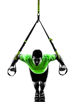 one caucasian man exercising   suspension training  trx   on white background