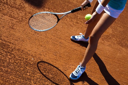 Young woman playing tennis