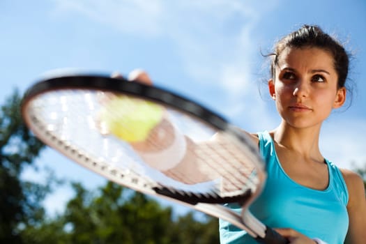 Girl playing tennis
