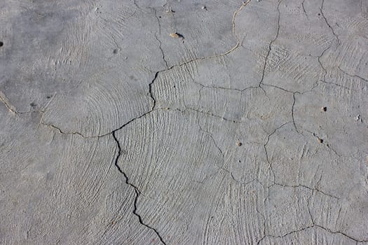 Grunge concrete cement wall with crack in industrial building