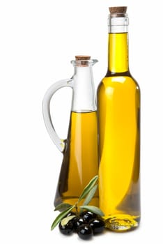 Jars with olive oil and some olives isolated over a white background.