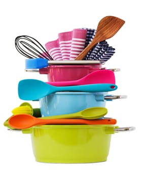 Colorful pots stacked with kitchen utensils,insulated on white
