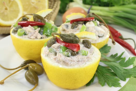 lemons stuffed with tuna cream and capers