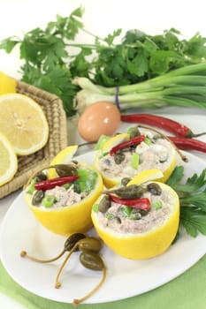 lemons stuffed with tuna cream and capers