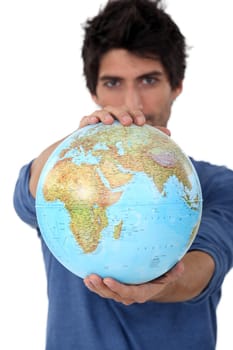 Man stood with globe