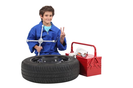 Little boy dressed as mechanic