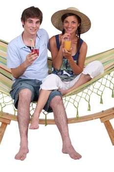 Teens in hammock