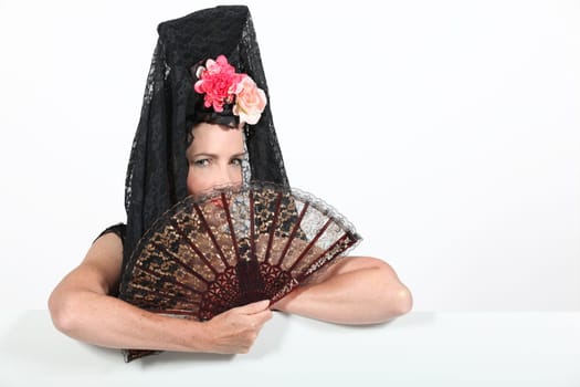 Woman with mantilla and fan