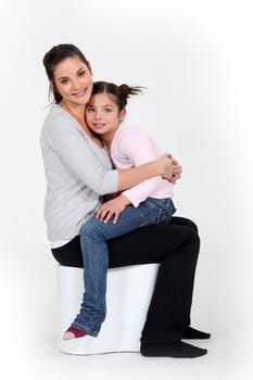 Woman hugging her child