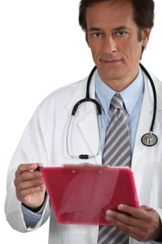 Doctor smiling with clipboard