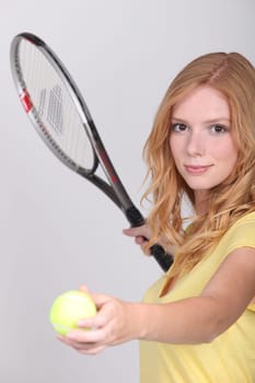 Girl playing tennis