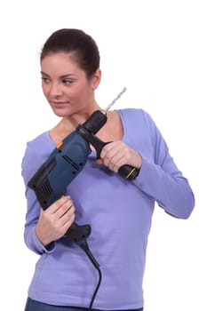 Woman holding drill