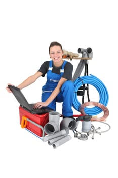 woman plumber with computer