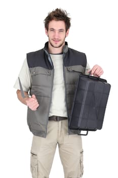 Tile fitter posing with his building supplies