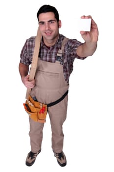 craftsman holding a visit card