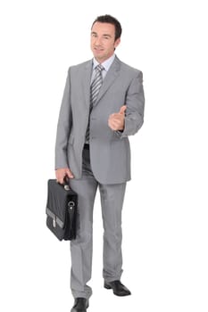 Businessman with thumbs up