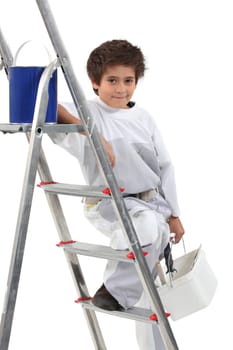 Young boy painting
