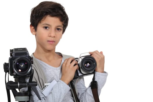 Little boy with two cameras