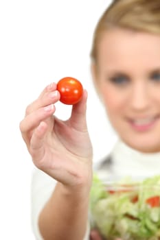 Woman holding a salad bowl