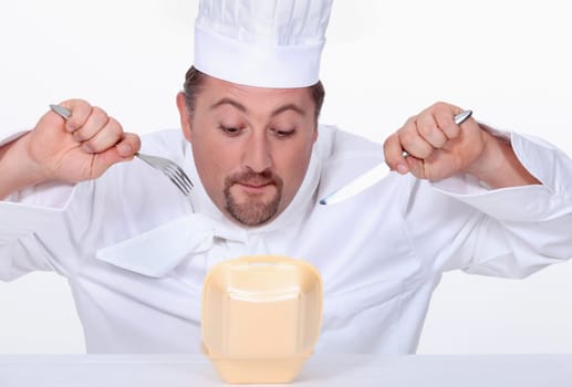 Chef eating junk food