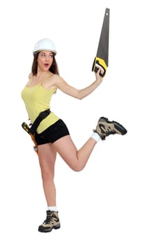 Woman doing pirouettes with a handsaw