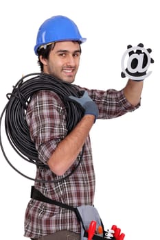 Electrician holding at symbol