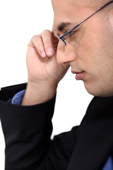Bald businessman wearing glasses
