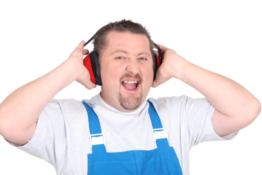 Worker wearing earmuffs