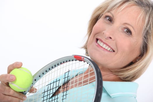 mature woman liking tennis