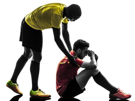 two men soccer player playing football competition  fair play concept in silhouette  on white background