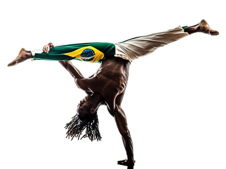 one brazilian  black man dancer dancing capoiera on white background