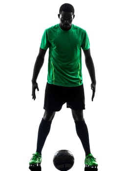 one african man soccer player green jersey standing in silhouette  on white background