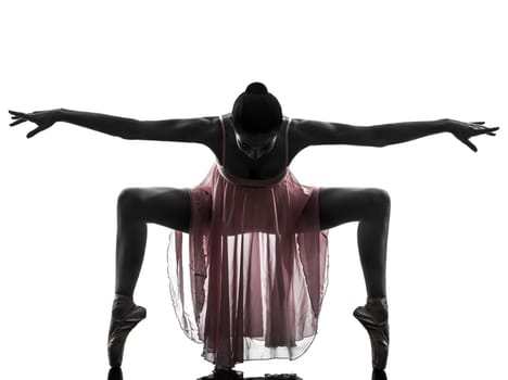 one  woman   ballerina ballet dancer dancing in silhouette on white background